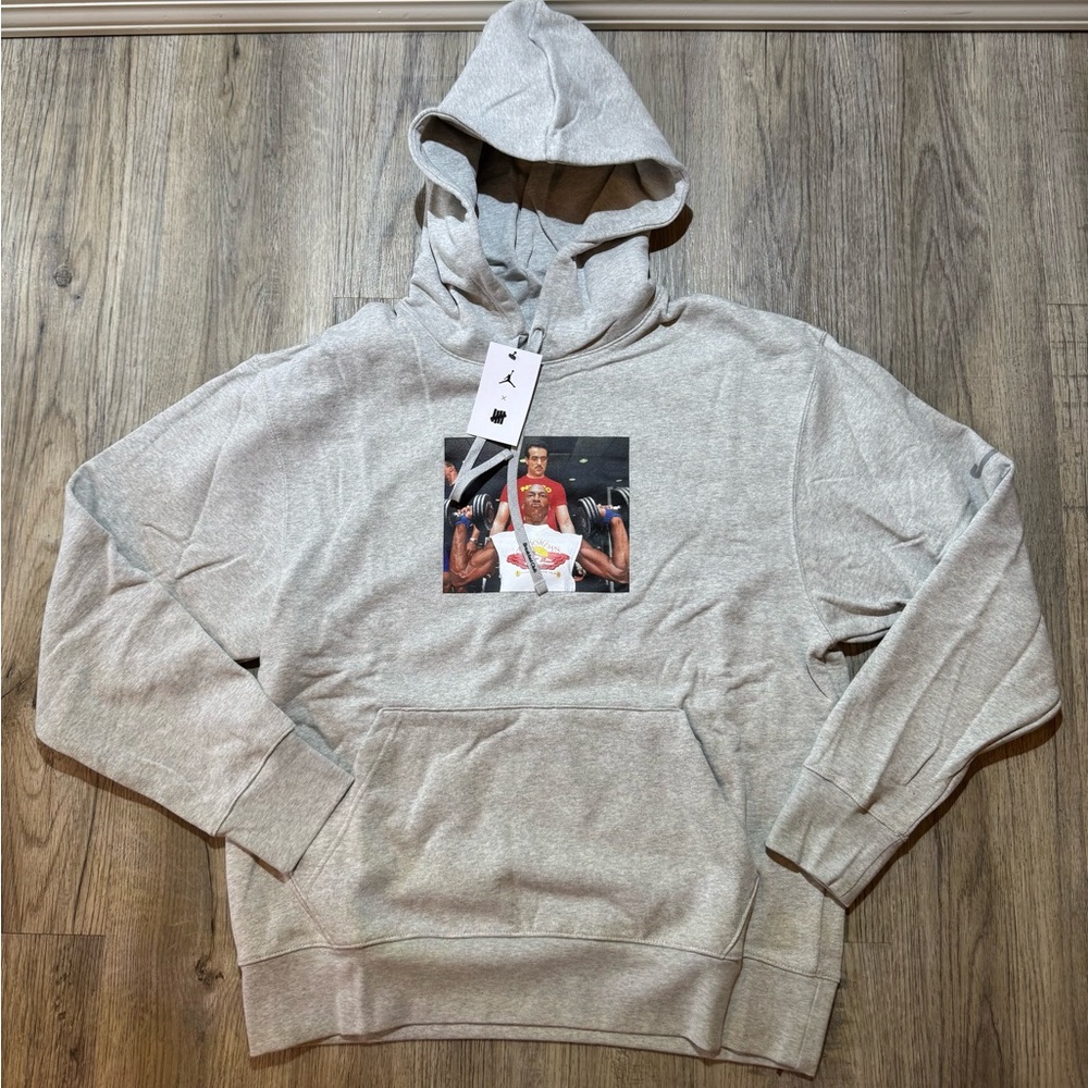 Jordan
Air Jordan x Undefeated Weights Hoodie 'Heather Grey' DX6317-050